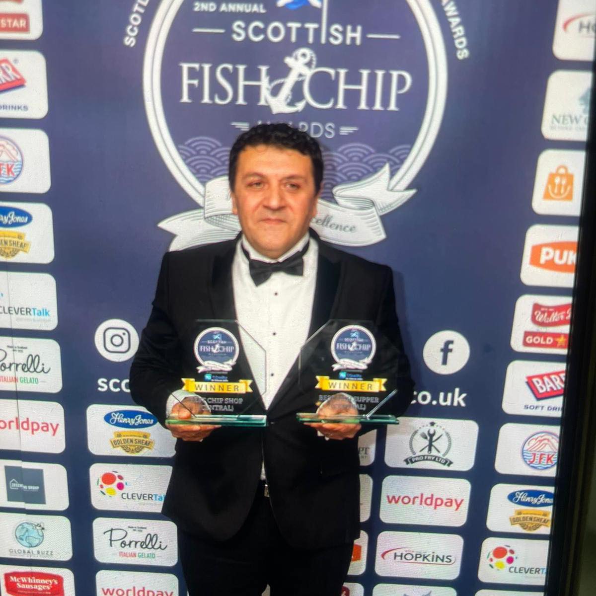 Vincenzo with awards